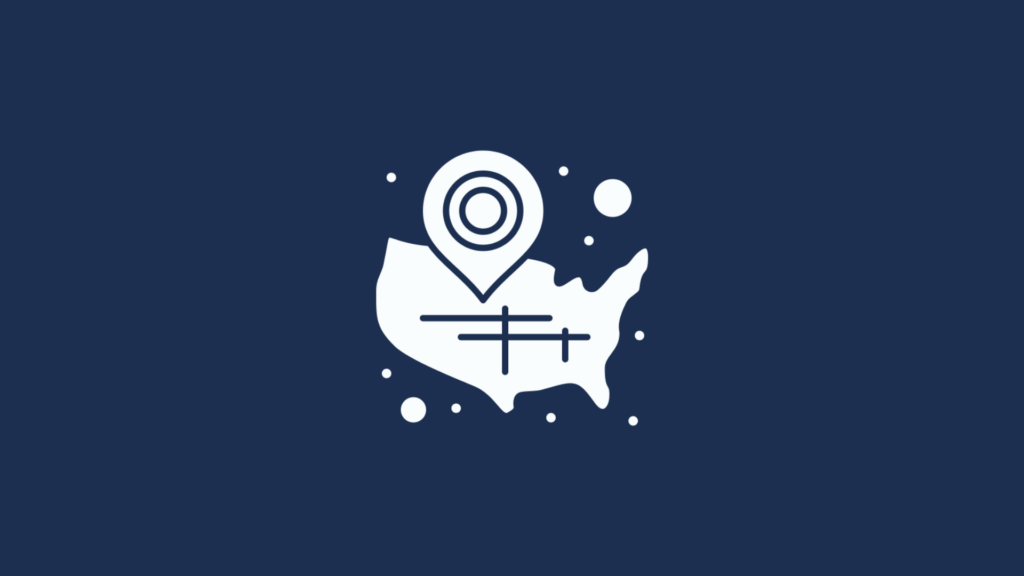 A blue and white icon depicting a pinpoint on a stylized map, representing location or navigation.
